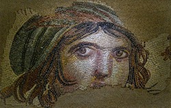 Gypsy girl mosaic in the Zeugma museum in Gaziantep, Turkey. The Museum is one of the largest mosaic collection in the world. The ancient city of Zeugma have been founded by Alexander the Great