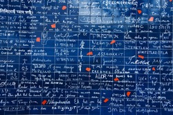 Wall in Paris with 'I love you' written in all the major international languages. 