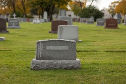 Autumn cemetery grave stone tombstone