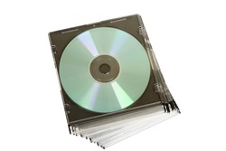 cd dvd piled up on white background