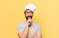 young bearded chef man thinking expression