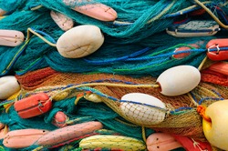background of colorful fishing nets and floats