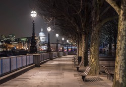 River Thames riverbank near Waterloo Bridge in night, London, South Bank.