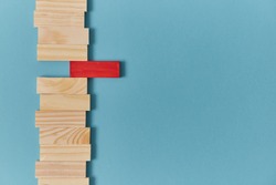 Stand out from crowd mockup. Not like everyone. White crow. Uniqueness and originality. Wooden planks with red block