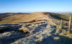 Views of Mozie Law from Windy Gyle on a sunny but frosty winters morning in the Northumberland Cheviot mountains at sunrise, UK.