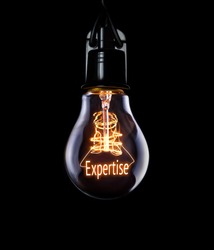 Hanging lightbulb with glowing Expertise concept.