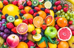 Fresh assorted fruits background.Love fruits, healthy food.