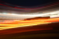 Attractive Glowing Colored Abstract Neon Lights in Motion for Wallpaper Background.