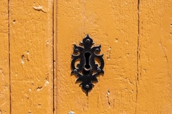 Old lock on wooden door