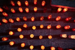 Tribute to the deceased with red candles
