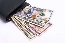 Cash of  dollar note, dollar background. Lot of one hundred dollar bills close-up. dollars in wallet on white background