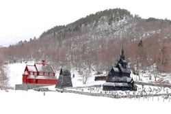 Borgund, Norway. Famous Landmark Stavkirke An Old Wooden Triple Nave Stave Church in winter. Ancient Old Wooden Worship In Norwegian Countryside Landscape.	