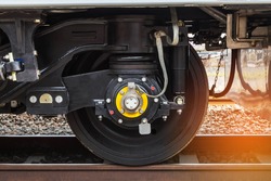 Close up modern wheel train system on track