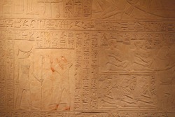 Ancient Egyptian men and women, hieroglyphics and reliefs of Egypt, close up