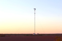 Communication tower at desert plain in Red Centre, Outback Australia