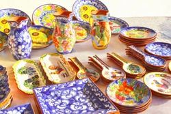 Collection of colorful Portuguese ceramic pottery, local craft products hand made in Portugal 