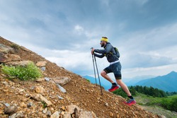 Climb a mountain with Nordic walking sticks