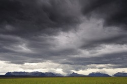 Storm clouds over mountain range