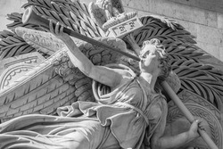 Statue of angel on the Arc de Triomphe in Paris, France