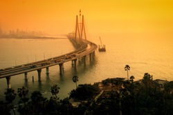 The Bandra-Worli Sea Link, also called Rajiv Gandhi Sea Link at dusk. It is a cable-stayed vehicular bridge that links Bandra in the northern suburb of Mumbai with Worli in South Mumbai. 