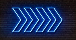 Neon sign on a brick wall - Arrows