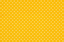 Yellow fabric with white polka dots