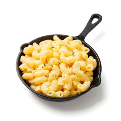 Mac and cheese, american style macaroni pasta with cheese sauce. isolated on white background