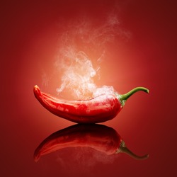 Hot red chili smoking or steaming with reflection