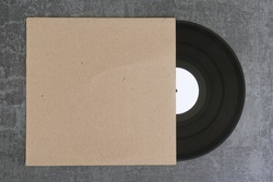 White label vinyl record and generic blank cardboard sleeve. Design element with copy-space for your logo or artwork.