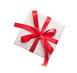Red gift box with ribbon isolated on white