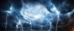 Lightning thunderstorm flash over the night sky. Concept on topic weather, cataclysms (hurricane, Typhoon, tornado, storm) 