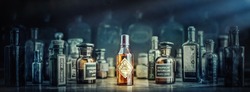 A bottle of poison on a background of old medical, chemistry and pharmacy glass. Chemistry and pharmacy history panoramic concept background. Retro style.
