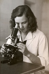 dark hair girl with the microscope - photo scan - about 1955