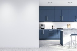 Interior of modern kitchen with white walls, concrete floor, blue countertops and cupboards, marble bar with stools and white mock up wall on the left. 3d rendering
