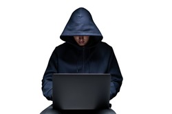 Isolated portrait of unrecognizable young hacker in black hoodie using laptop. Concept of cyber security and data protection