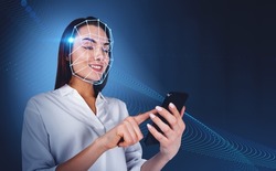 Businesswoman smiling and finger touch phone, biometric verification and facial recognition. Unlocking smartphone with scanner. Concept of face id and technology