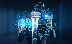 Businessman in formal suit is touching digital interface with hand wearing vr helmet. Hologram of brain, globe, laptop, pie and bar diagram in the foreground. Concept of cyberspace and virtual reality