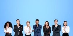 Group portrait of seven pensive diverse business people thinking standing in row over blue background. Concept of brainstorming and teamwork