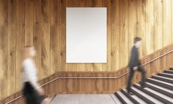 Side view of blank poster on wooden wall and businesspeople climbing stairs. Mock up, 3D Rendering