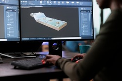 Close up of graphics industry person with high modelling skills working with advanced software technology. Close up of digital artist working on 3D model to improve geometry and optimise project.