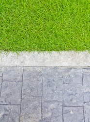 Close up of street and grass background