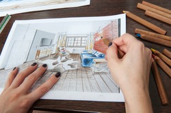 Outline drawings for the design of the kitchen design, everything is drawn in pencil. Beautiful, brick walls.