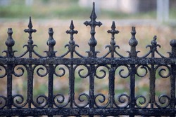 Old decorative wrought iron fence