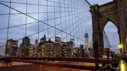 The Brooklyn bridge at dusk with downtown Manhattan, New York City. USA.