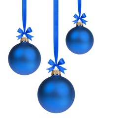 composition from three blue christmas balls hanging on ribbon, white background