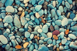Abstract nature pebbles background. Blue pebbles texture. Stone background.  Blue vintage color. Sea pebble beach. Beautiful nature. Turquoise color