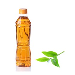 Bottle of green tea with tea leaf isolated on white background