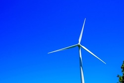 Wind turbines and blue sky background
