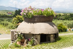 Mirzi i zanave,Albania. Bunkers in Albania decorated with flowers