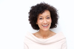 Close up portrait of attractive middle age african american woman smiling against white background